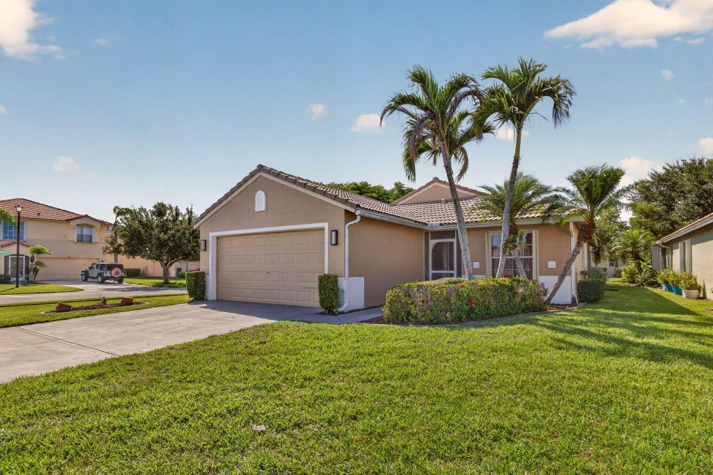 Photo of 628 Stanford Lane, Port Saint Lucie, FL 34983 (MLS # B26076072)