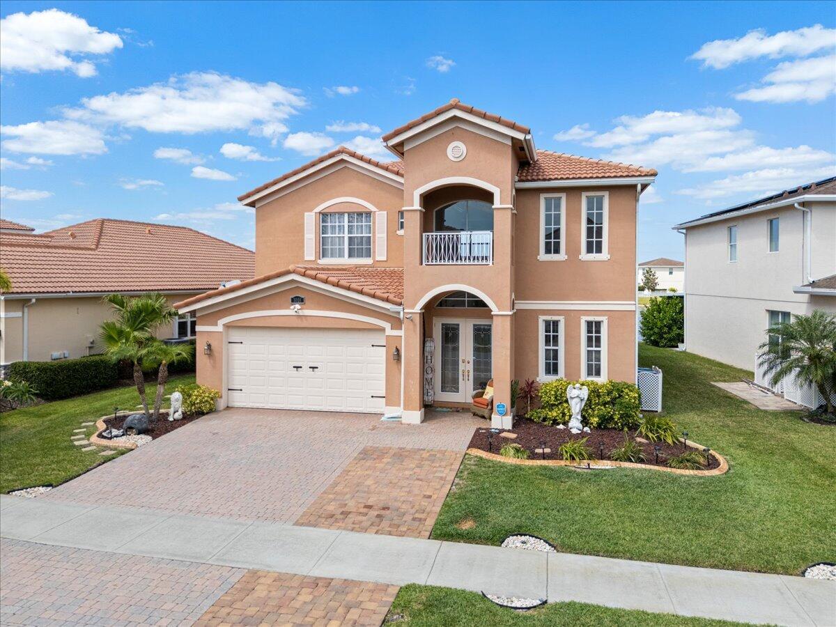 Welcome to this stunning 4-bedroom, 2.5-bath home in the highly desirable Vizcaya Falls community--where everyday living feels like a vacation. Enjoy peaceful lake views, an open and functional layout, and access to resort-style amenities just steps from your door. This two-story CBS home features tile flooring throughout the entire first floor, with luxury vinyl on the staircase and upstairs common areas, and soft carpet in the bedrooms for added comfort. Soaring ceilings are highlighted by upgraded crown molding, designer light fixtures, and a show-stopping chandelier that adds a touch of elegance throughout. The upgraded kitchen is a chef's dream--complete with granite countertops, a center island, and a charming breakfast nook. The first-floor primary suite offers true relaxation with