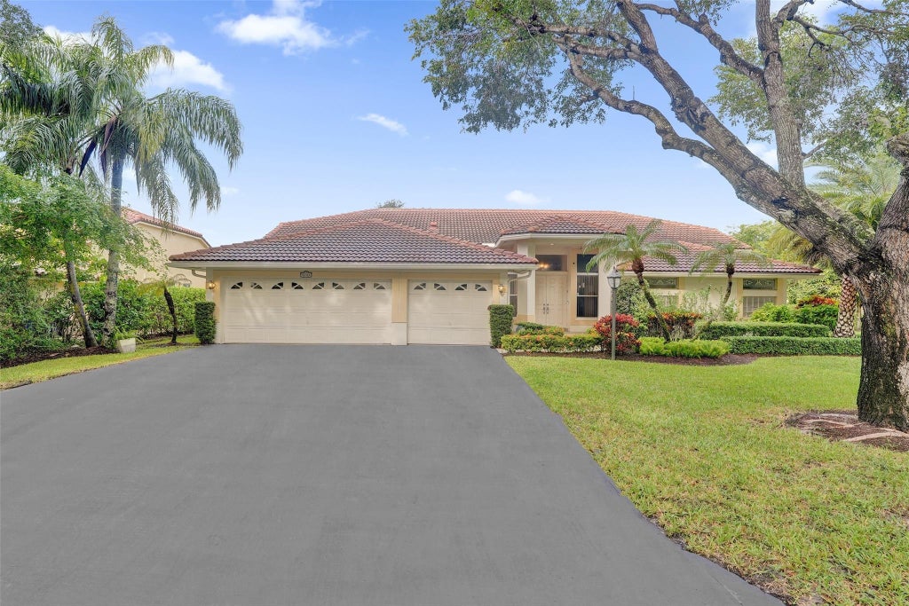 Photo of 5724 NW 100th Way, Coral Springs, FL 33076 (MLS # F10528175)