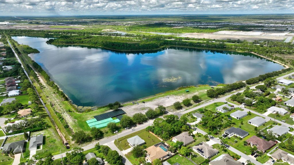 Photo of 1641 SE Mansfield Street, Port Saint Lucie, FL 34952 (MLS # R11039751)