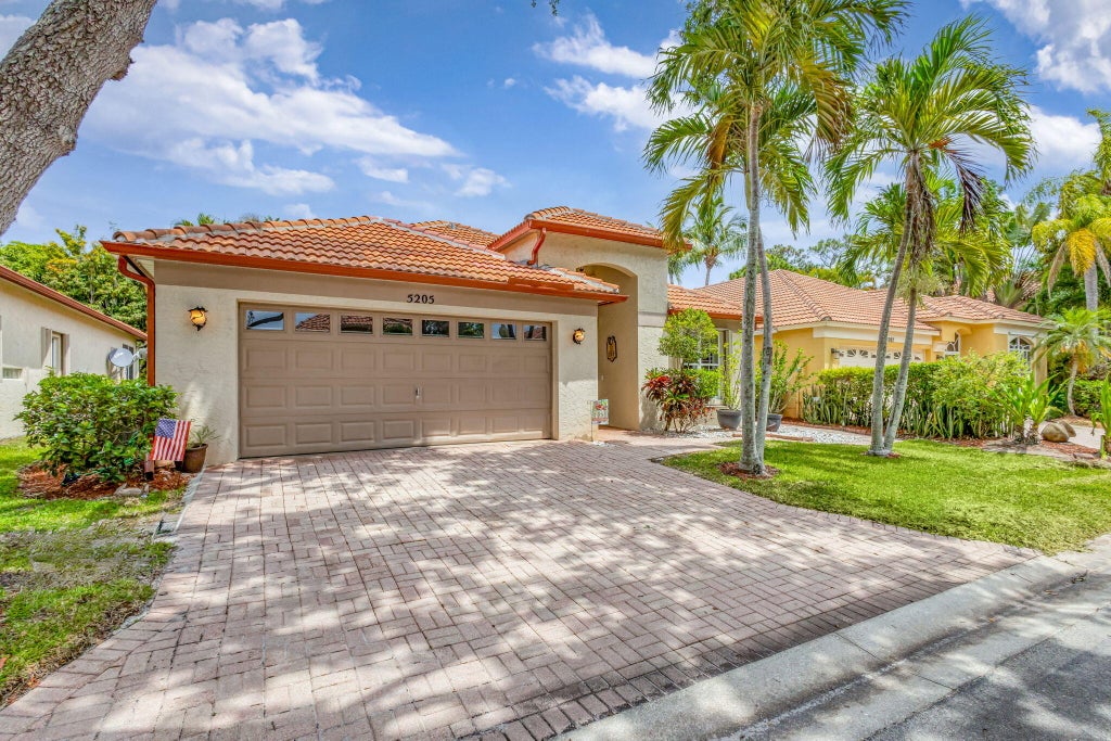 Photo of 5205 Edenwood Road, Riviera Beach, FL 33418 (MLS # R11084042)