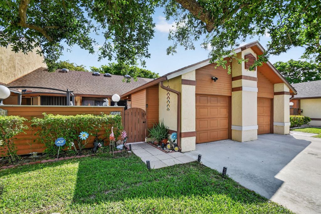 Photo of 3723 Collinwood Lane, West Palm Beach, FL 33406 (MLS # B26024094)