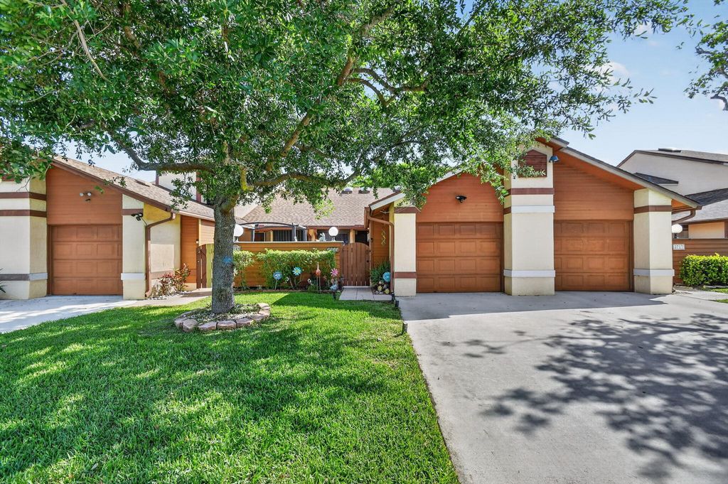 Photo of 3723 Collinwood Lane, West Palm Beach, FL 33406 (MLS # B26024094)