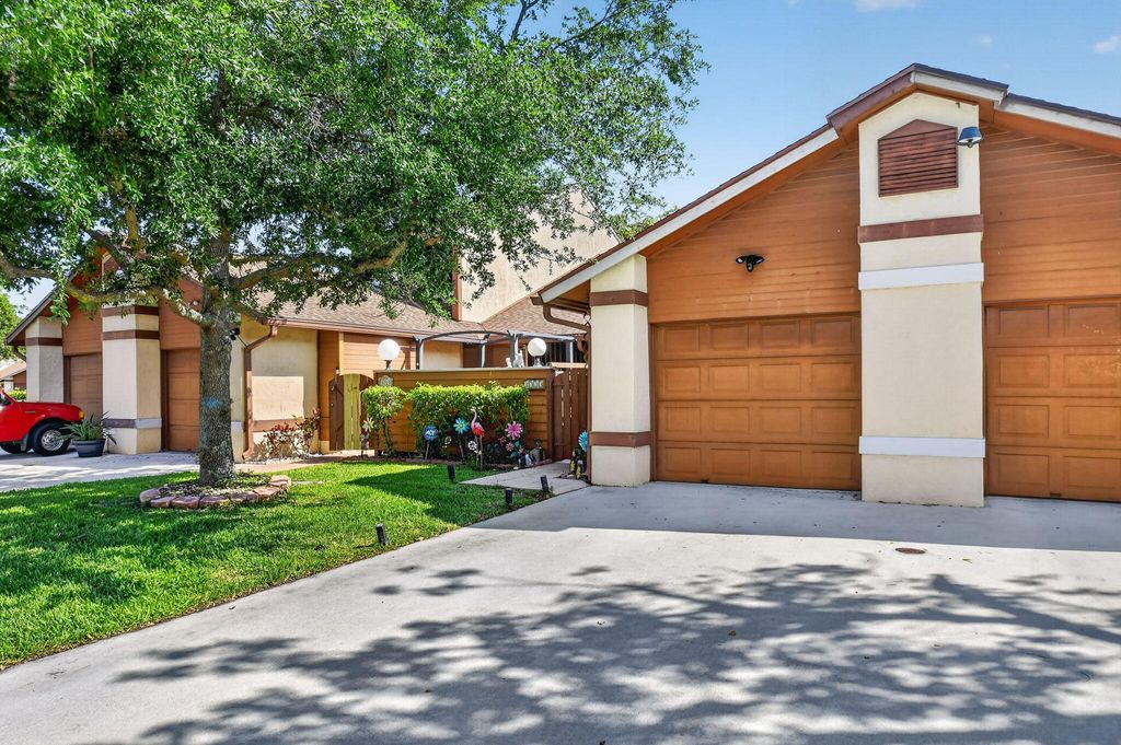 Photo of 3723 Collinwood Lane, West Palm Beach, FL 33406 (MLS # B26024094)