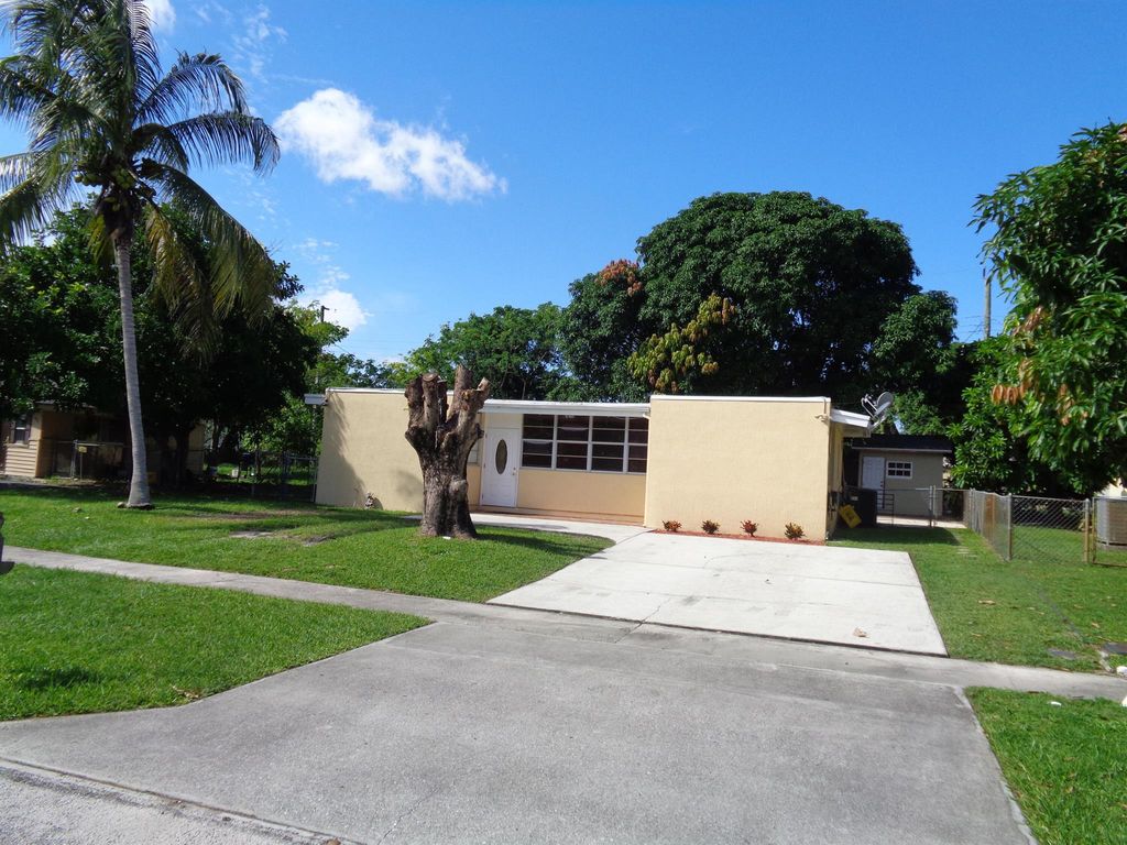 Photo of 455 Pensacola Drive, Lake Worth, FL 33462 (MLS # R10928438)