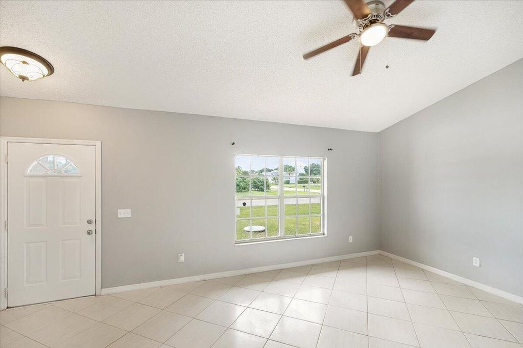 Photo of 2598 SE University Terrace, Port Saint Lucie, FL 34952 (MLS # R10988812)