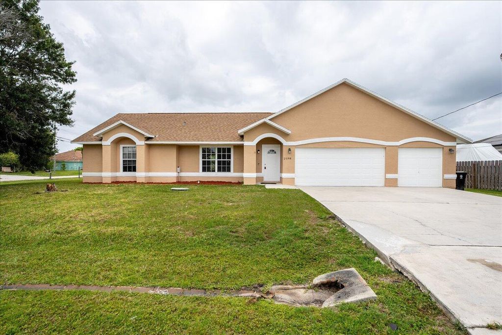 Photo of 2598 SE University Terrace, Port Saint Lucie, FL 34952 (MLS # R10988812)