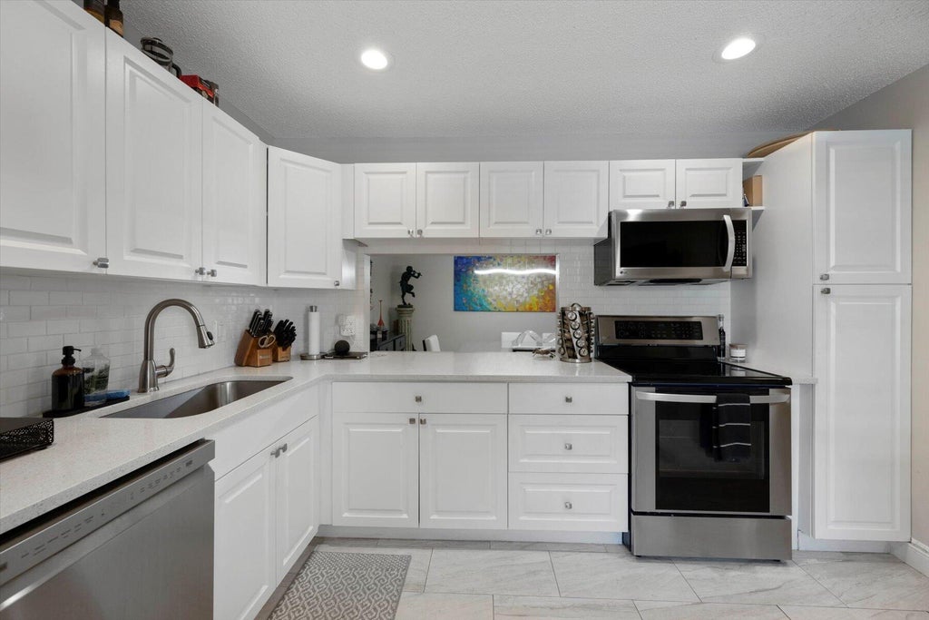 Photo of 145 Lake Nancy Lane #232, West Palm Beach, FL 33411 (MLS # B26050017)