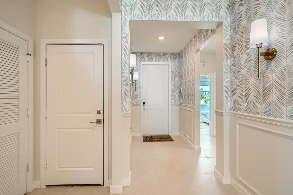 Photo of 1822 NE Ocean Dunes Drive, Jensen Beach, FL 34957 (MLS # R10958983)