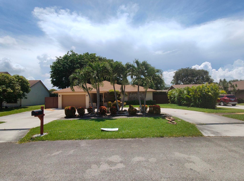 Photo of 616 White Water Drive, West Palm Beach, FL 33413 (MLS # R11131707)