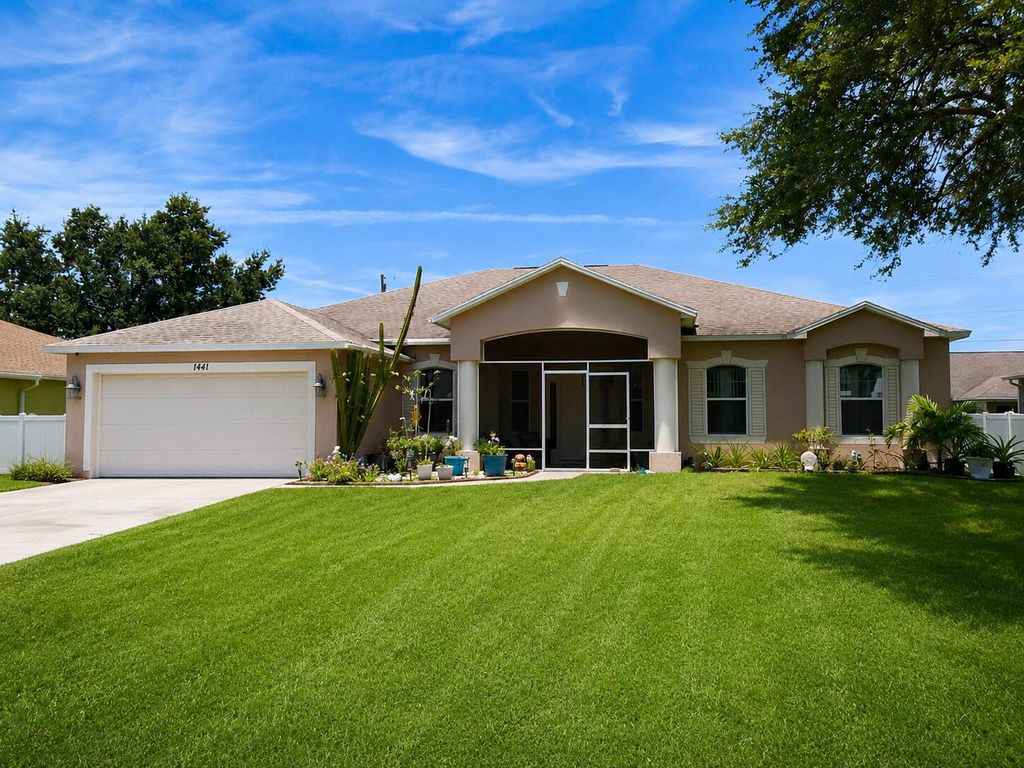 Photo of 1441 SW Jacksonville Avenue, Port Saint Lucie, FL 34953 (MLS # B26035353)