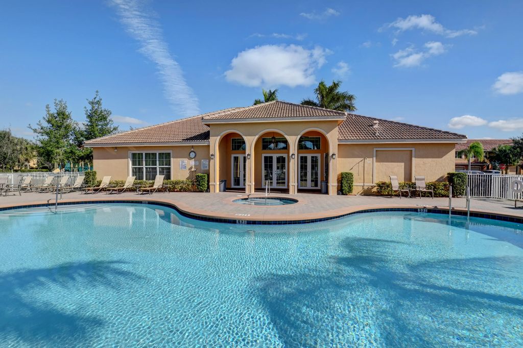 Photo of 5797 Monterra Club Drive, Lake Worth, FL 33463 (MLS # R11168146)
