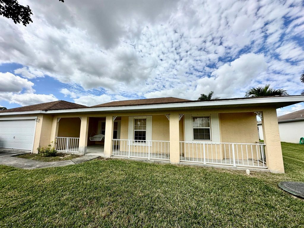 Photo of 4218 SW Mcclellen Street, Port Saint Lucie, FL 34953 (MLS # R10960832)