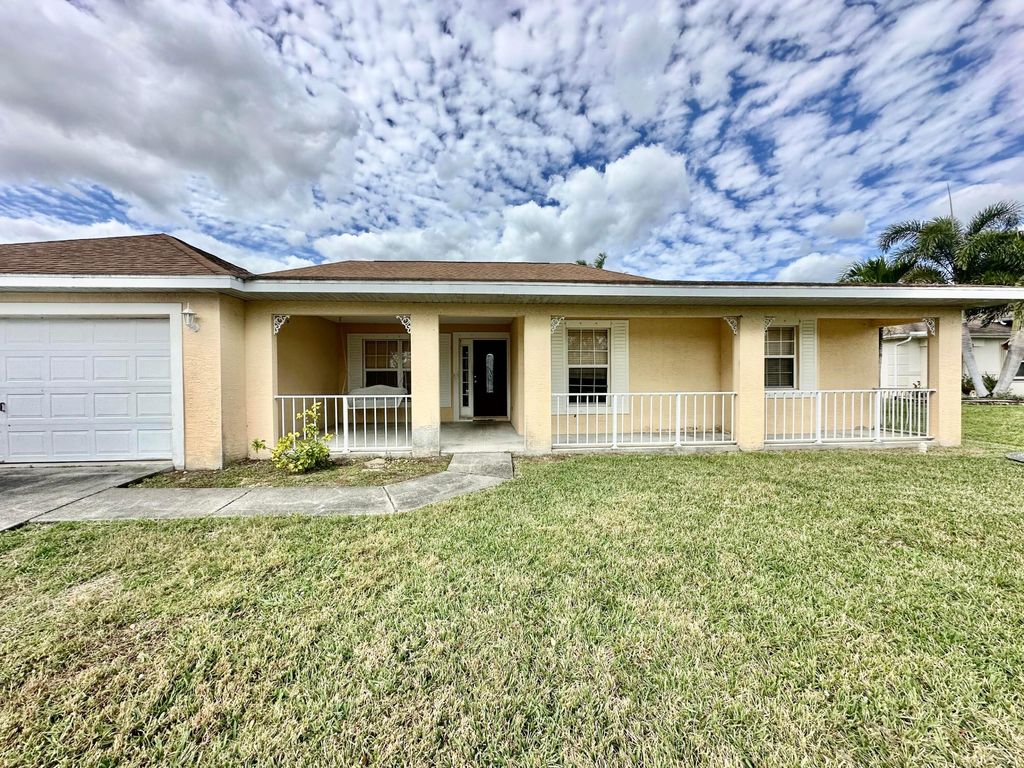 Photo of 4218 SW Mcclellen Street, Port Saint Lucie, FL 34953 (MLS # R10960832)