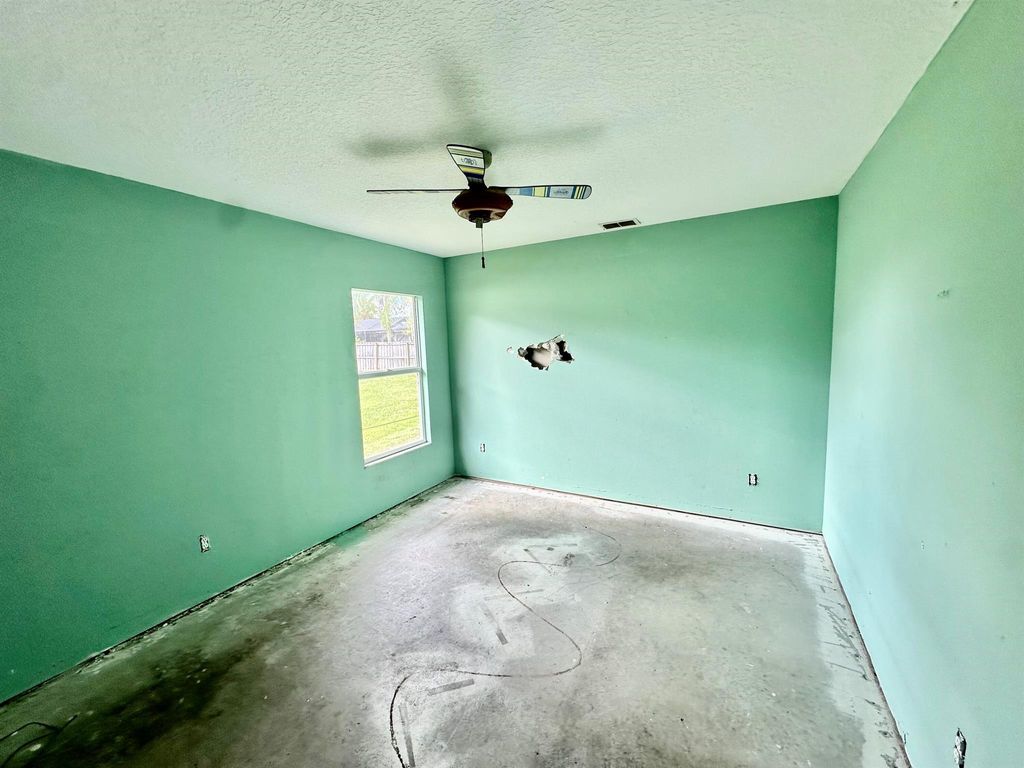 Photo of 4218 SW Mcclellen Street, Port Saint Lucie, FL 34953 (MLS # R10960832)