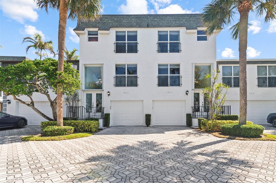 Come view and experience this exceptional six-bedroom townhome with Atlantic Ocean views. It offers water views from every level and includes a private boat dock on the Intracoastal Waterway and private beach access. The community features 500 feet of private beach with two shower stations, two swimming pools with hot tubs, a private tennis court and 300 feet of boardwalk on the Intercoastal waterway. This is truly a rare opportunity to own an estate home on the prestigious Hillsboro Mile. THIS PROPERTY WAS BUILT AS TWO SEPERATE TOWNHOMES. GREAT INVESTOR OPPORTUNITY FOR RENTAL WITH TWO SEPERATE REVENUE POSSIBILITIES.