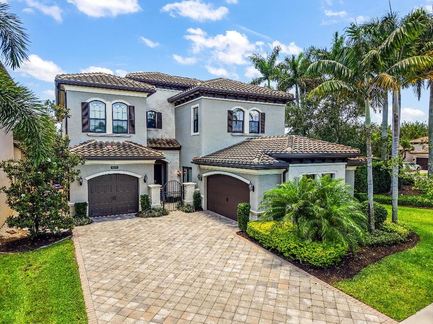 Located in the prestigious, gated community of The Bridges in Delray Beach, this Sanibel model is the perfect blend of elegance, space, & functionality. With 5 bedrooms, 7.5 bathrooms, a 3-car garage, & almost 5,200 square feet under air, this 2-story estate offers luxurious living on a desirable corner lot. Before you even enter the main residence, a courtyard-style approach welcomes you with the option to access a separate clubroom, featuring its own private entry. Perfect for an in-home office, guest quarters, or creative space, this flexible room offers the ultimate in privacy & functionality for today's modern lifestyle. Inside the home, light fills the open floor plan, enhanced by impact glass throughout, 30x30 porcelain tile floors, & refined finishes at every turn. The gourmet kitchen is a showstopper with ceiling-height cabinetry, KitchenAid appliances, & natural gas for the stove, dryer, water heater, & outdoor BBQ. A downstairs bedroom with en suite bath offers a private space for guests or extended family. Upstairs, you'll find the primary suite plus 3 additional en suite bedrooms, providing privacy & comfort for everyone. The primary suite is a true retreat, complete with his-&-her spa-style bathrooms, 2 oversized walk-in closets, & abundant natural light. A spacious loft & full laundry room complete the upper level. Step outside into your private paradise, where a brand-new (2024) saltwater pool & spa awaits. With a sunshelf, waterfall feature, & remote-controlled heating & cooling, this space is built for year-round enjoyment. A cabana bath with shower & a fully fenced yard add both style & convenience.
Additional features include two A/C units, & ample storage throughout. 
Living in The Bridges means access to world-class amenities, including a 17,000+ square foot clubhouse with a full-service restaurant & outdoor bar, resort-style pool with shaded cabanas, a state-of-the-art fitness center, indoor sports complex, & seven lighted tennis courts with on-site pro shop, instructor and NEW pickleball courts being built. Families will appreciate the splash park, shaded playground, game room, & a robust calendar of community events curated by a full-time lifestyle director.
This home checks every box for luxury, flexibility, & lifestyleschedule your private showing today & discover everything The Bridges has to offer.