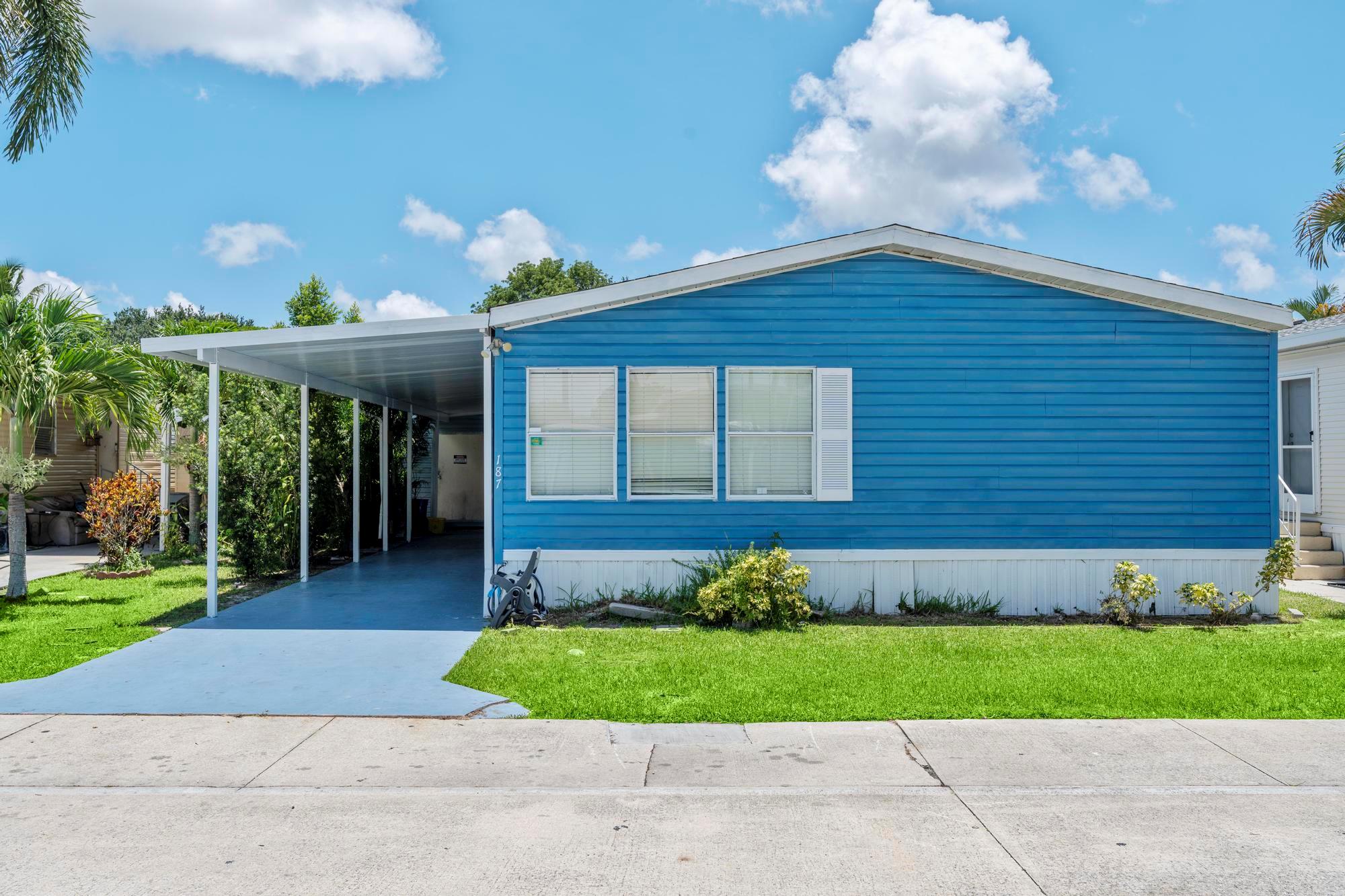 Beautiful 3BR/2BA home located in the all age family-friendly community of Palm Beach Plantation. Covered 2-car carport w/large storage shed. Community offers clubhouse, basketball, playground, pool, and A-rated schools. Close to shopping mall, restaurants & ocean beaches. Monthly fee includes lot rent, lawn care, cable, real estate taxes and trash. All appliances convey. All offers welcome!