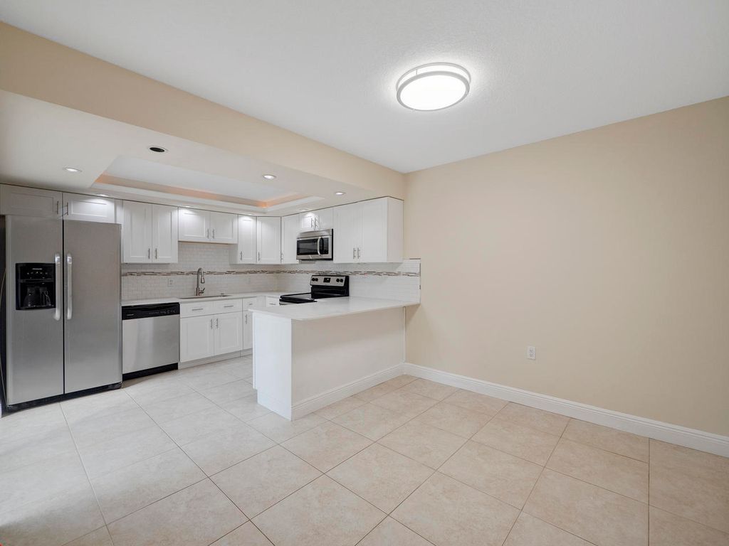 Photo of 2214 22nd Lane, Palm Beach Gardens, FL 33418 (MLS # R11089363)