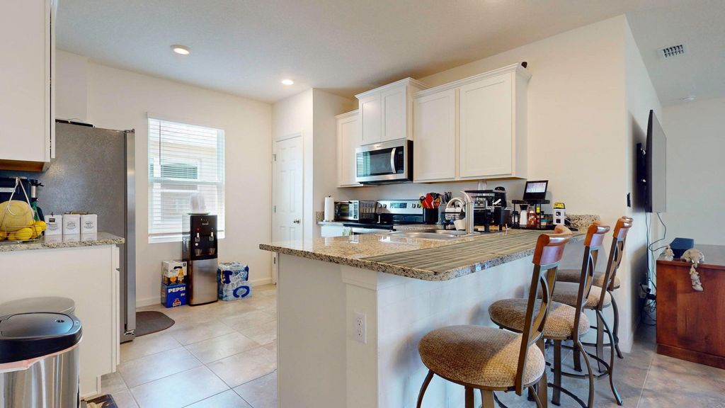 Photo of 9398 SW Ligorio Way, Port Saint Lucie, FL 34987 (MLS # R11157735)