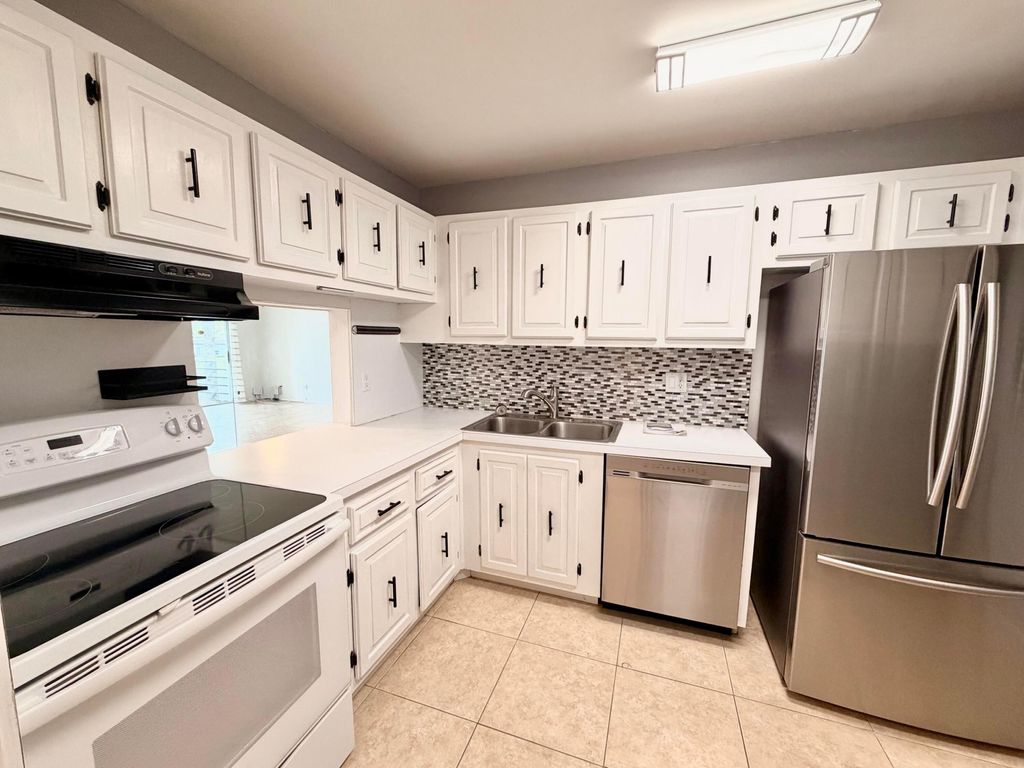 Photo of 120 Lake Evelyn Drive, West Palm Beach, FL 33411 (MLS # B26032328)
