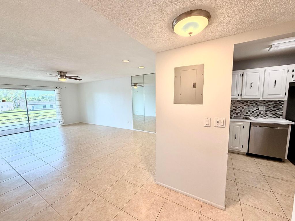 Photo of 120 Lake Evelyn Drive, West Palm Beach, FL 33411 (MLS # B26032328)