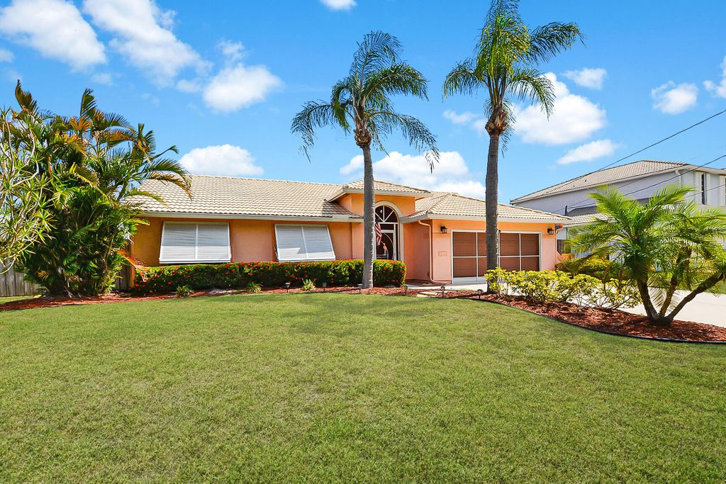 Photo of 107 NE Royce Avenue, Port Saint Lucie, FL 34983 (MLS # R10995064)