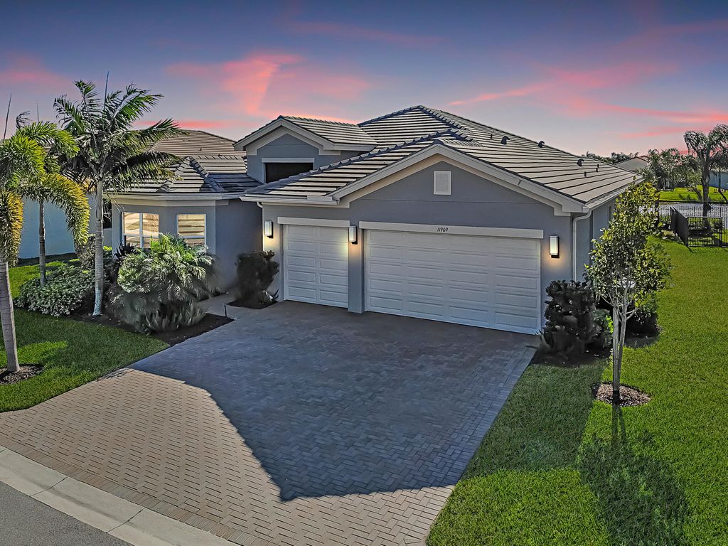 Photo of 11909 SW Hunter Hill Avenue, Port Saint Lucie, FL 34987 (MLS # R10973269)