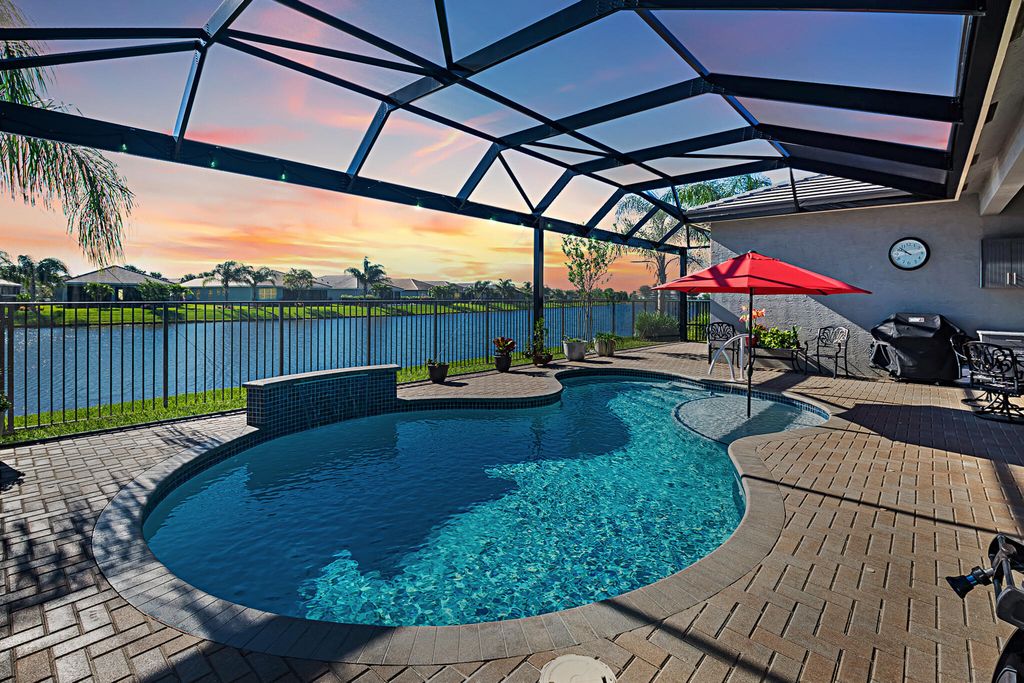 Photo of 11909 SW Hunter Hill Avenue, Port Saint Lucie, FL 34987 (MLS # R10973269)