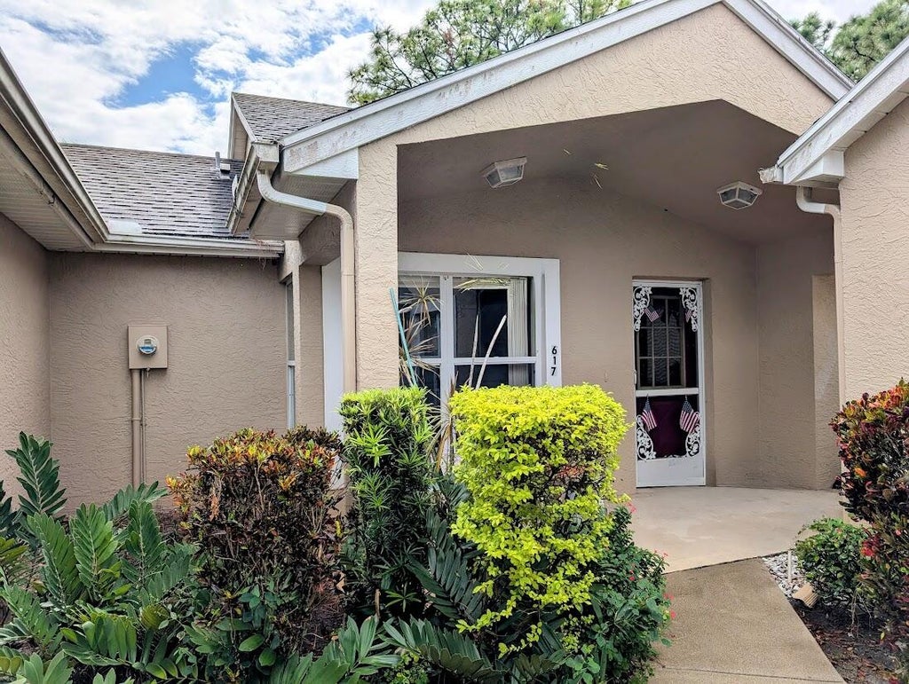Photo of 617 NW San Remo Circle, Port Saint Lucie, FL 34986 (MLS # R11033176)