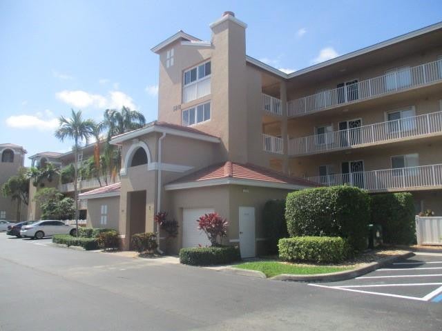 Photo of 5810 Crystal Shores Drive #102, Boynton Beach, FL 33437 (MLS # F10504982)