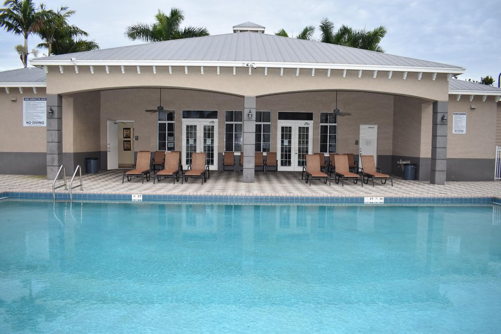 Photo of 1954 Marsh Harbor Drive #101, Riviera Beach, FL 33404 (MLS # B26038646)