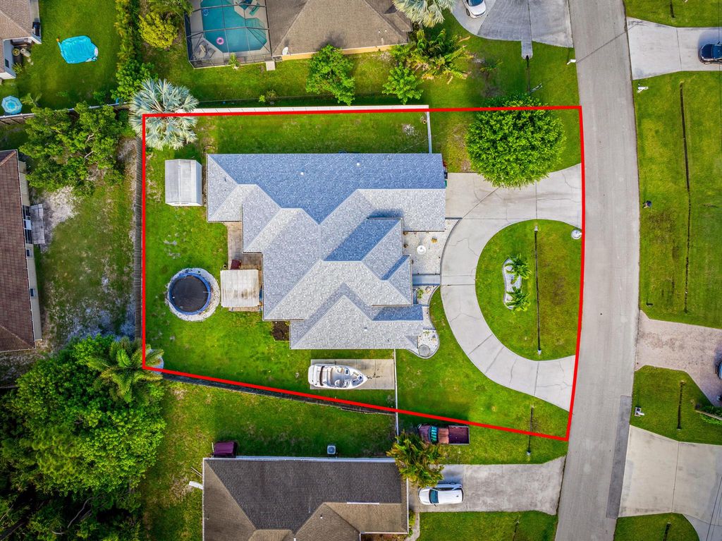 Photo of 5918 NW Hann Drive, Port Saint Lucie, FL 34986 (MLS # R11100049)