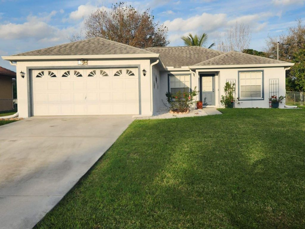 Photo of 6121 NW Densaw Terrace, Port Saint Lucie, FL 34986 (MLS # R10954044)