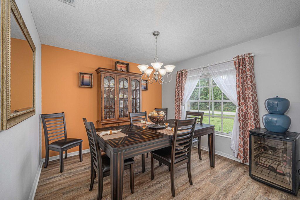 Photo of 6121 NW Densaw Terrace, Port Saint Lucie, FL 34986 (MLS # R10954044)