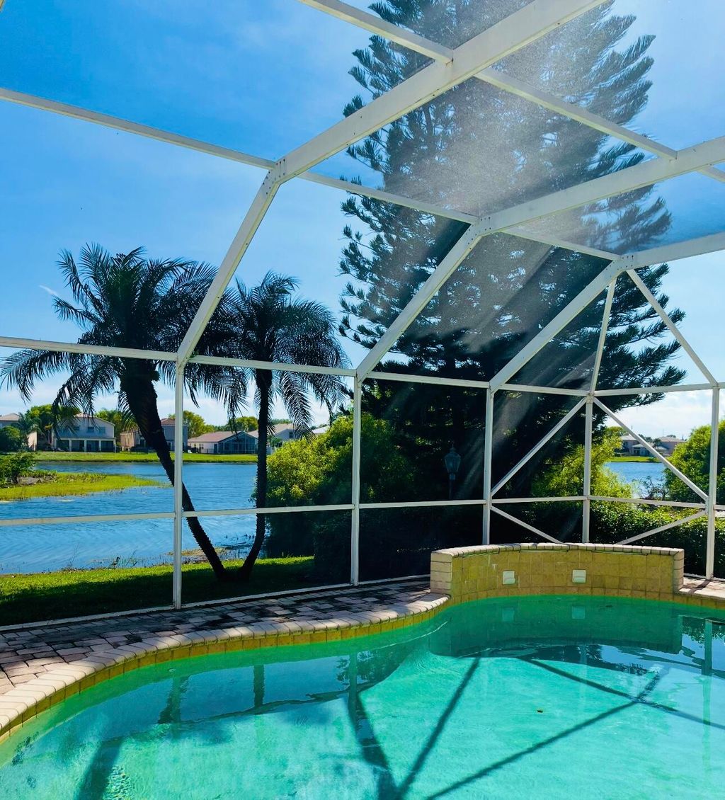 Photo of 7762 Oak Grove Circle, Lake Worth, FL 33467 (MLS # B26022073)