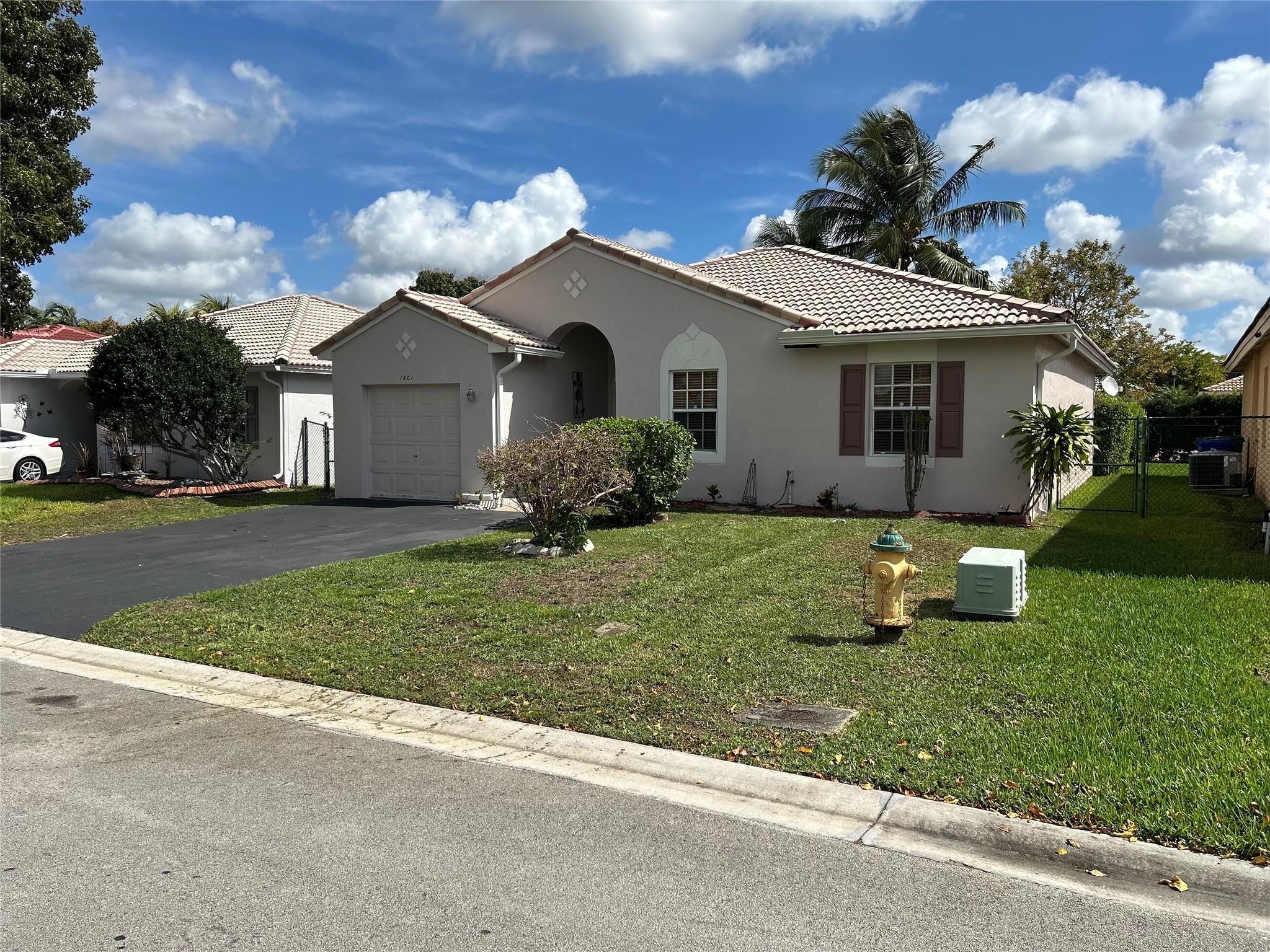 Big price reduction! Discover this 3-bedroom, 2-bathroom with one car garage in the desirable gated community of Villages of Renaissance in West Miramar conveniently located near the Florida turnpike and I-75. Minutes to shopping, entertainment and top-rated schools. This updated home offers both style and comfort. Features you will love are kitchen with brand-new stainless-steel appliances. New vinyl flooring durable and easy to maintain throughout the home. Split bedroom layout for privacy and space for everyone in the family, private and peaceful fenced in backyard. Freshly painted both inside and out making it move in ready for your family. Community perks include a guard gate, sparkling pool and tennis courts, playground and walking paths. No HOA approval. See broker remarks
