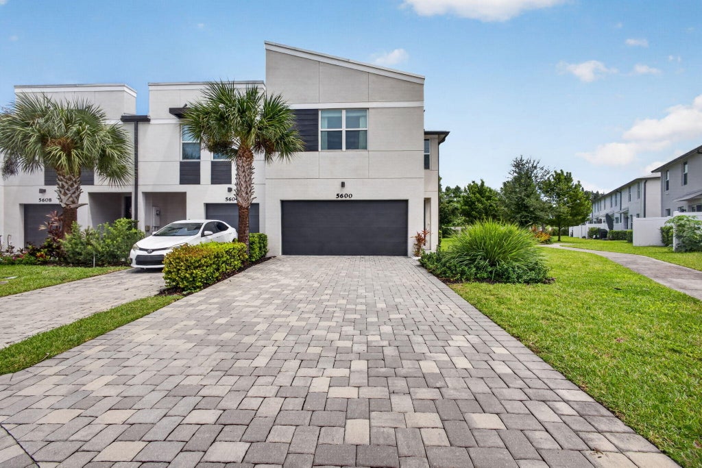 Photo of 5600 Mentmore Drive, West Palm Beach, FL 33407 (MLS # B26075045)