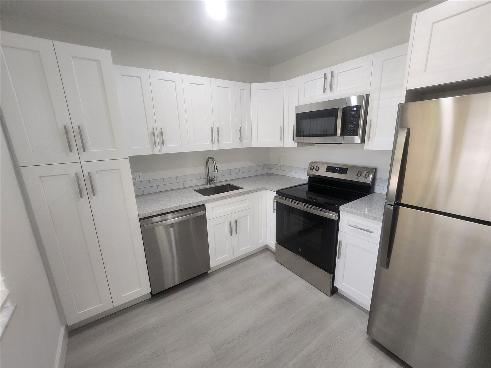 This convenient first floor 2 Bedroom and 2 full Bath Condominium has just been renovated for your enjoyment!
Completely painted, new GE kitchen appliances, new lighting, new flooring and more! Complex offers lots of
amenities with a super convenient location, handy to shopping, entertainment, beaches and I95. How in the World
do people live anywhere else? Please see the photos! Then come check it out! You'll be glad you did and your
relatives are going to be so jealous!