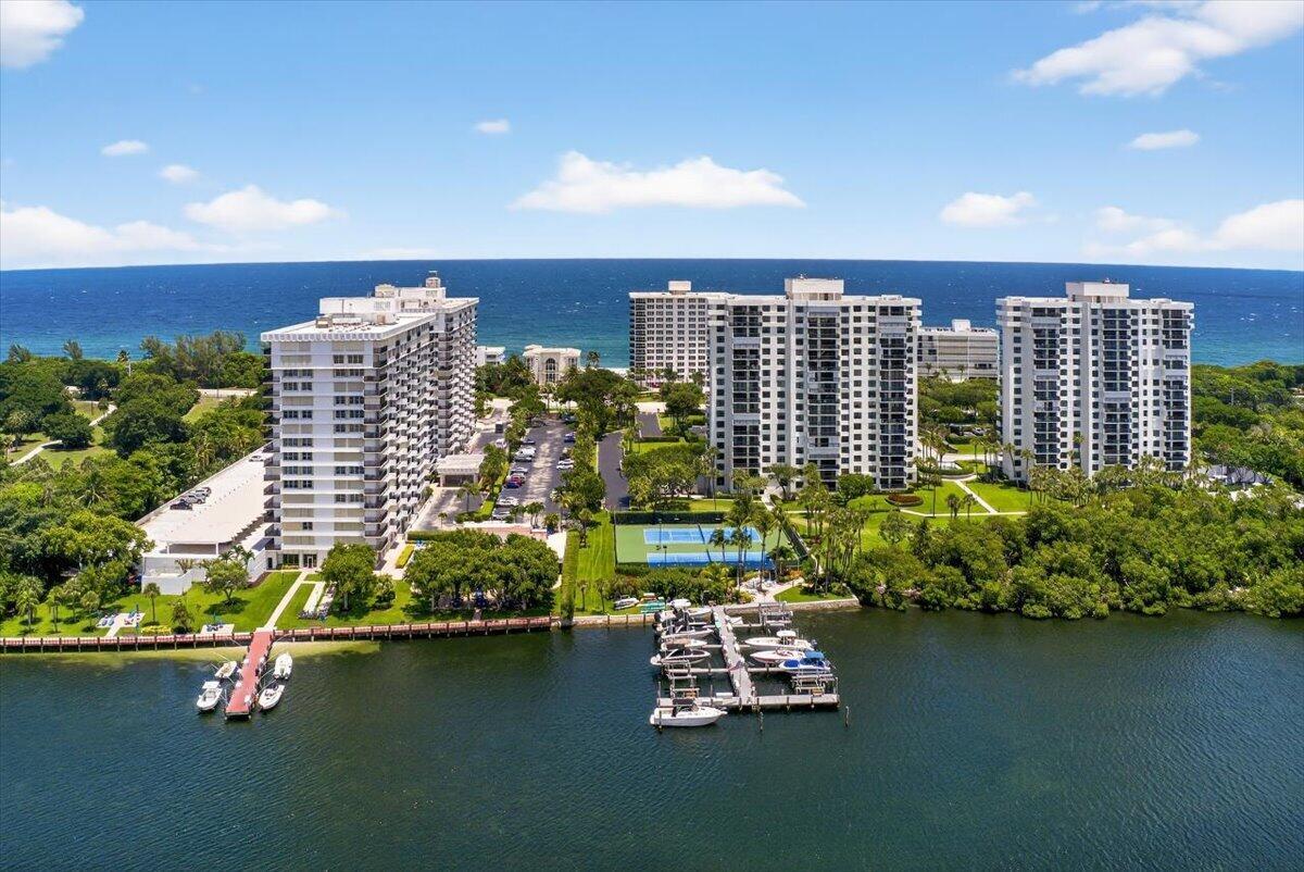 This Boca Raton's waterfront community has it all. This serene residence offers 10.5 lush acres of tranquility with two private tennis courts, 16 boat slips,paddle board launch, a peaceful picnic area, brand-new heated pool in a sanctuary setting. Unobstructed water views from all rooms in the resident. Watch boats glide by, enjoy sunrise or sunset, Flow through with yoga on the beautifully maintained grounds. Renovated within the past year, the residence features sleek porcelain tile, hurricane impact windows, storm shutters, a new kitchen and baths, all-new appliances and mechanicals. Secure, stylish, and steps from your private beach, executive golf courses, bike trails, parks, and fine dining--this is coastal living at its finest. Location is stunning and peaceful. All documents avail
