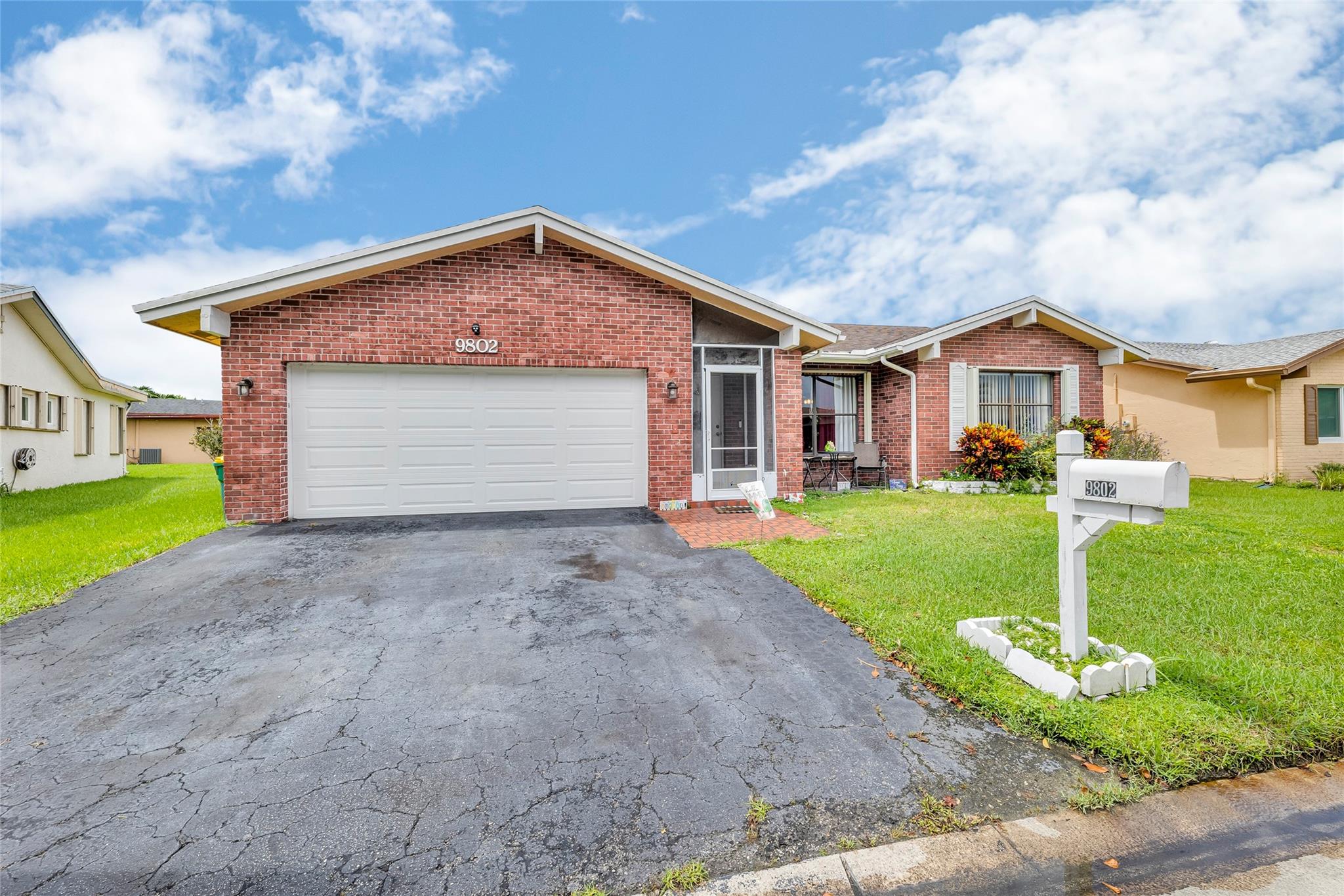 This is the largest 2 bedroom 2 bathroom home in the tranquil and beautifully well maintained community of
Springlake. This spacious home is perfect for entertaining or to construct an additional bedroom or office space if
desired. The attached 2-car garage is just off the kitchen with washer, dryer and laundry tub. The kitchen is
equipped with durable Formica countertop, 42" wood cabinets & a spacious, double-door pantry. The screened in
patio, off the formal dining room, is perfect for a quiet morning cup of coffee. This is a 55+ community with a very
affordable HOA that includes lawn care, sprinkler & exterior paint. It is conveniently located to shops, restaurants &
the Tamarac Sports Complex