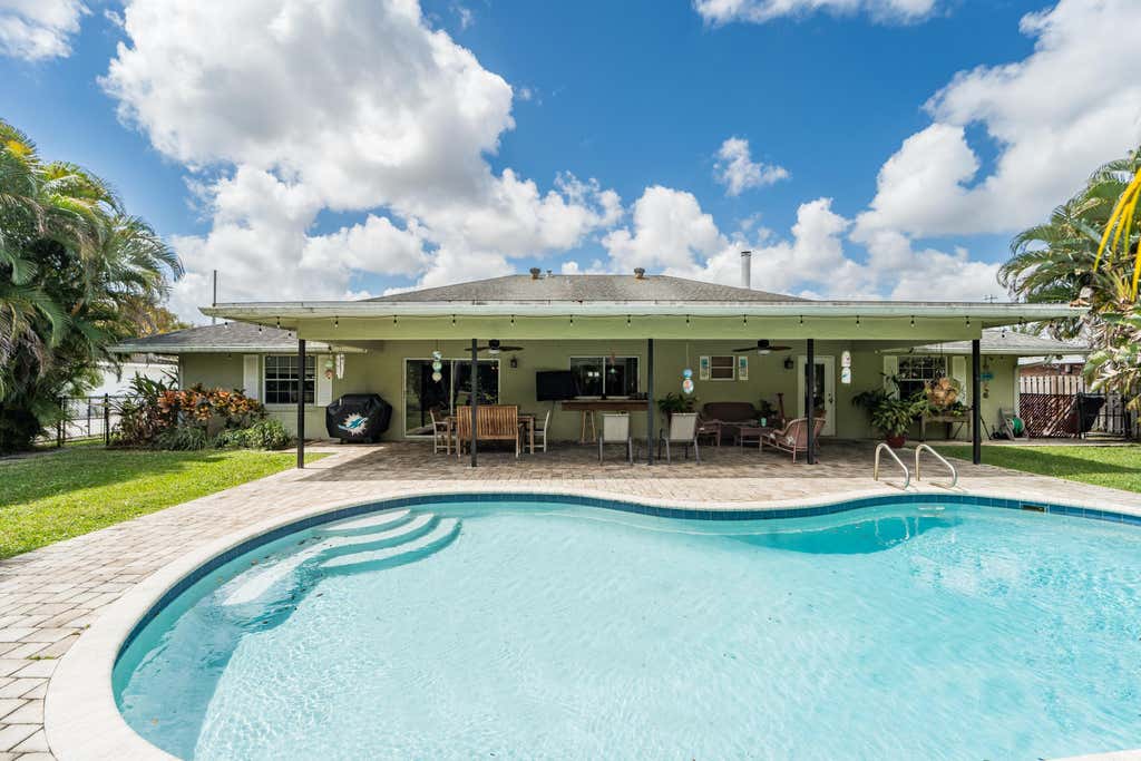 Photo of 3194 Pebble Beach Drive, Lake Worth, FL 33467 (MLS # B26002866)