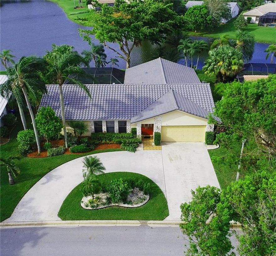 Gorgeous water views! Updated 4/2 pool home in Cypress Run. Choice, waterfront home site = tranquility & privacy. Great floor plan for entertaining. Kitchen has extensive granite countertops that carry into the patio, knockdown paint, recessed & LED lights, wood laminate flooring, crown molding in master bdrm, upgraded cabana bathrm, screen-enclosed patio with large pool, roof is 4 years old, A/C is new, double front doors with etched glass. Master bathrm renovation to be completed by 11-8. Must see!