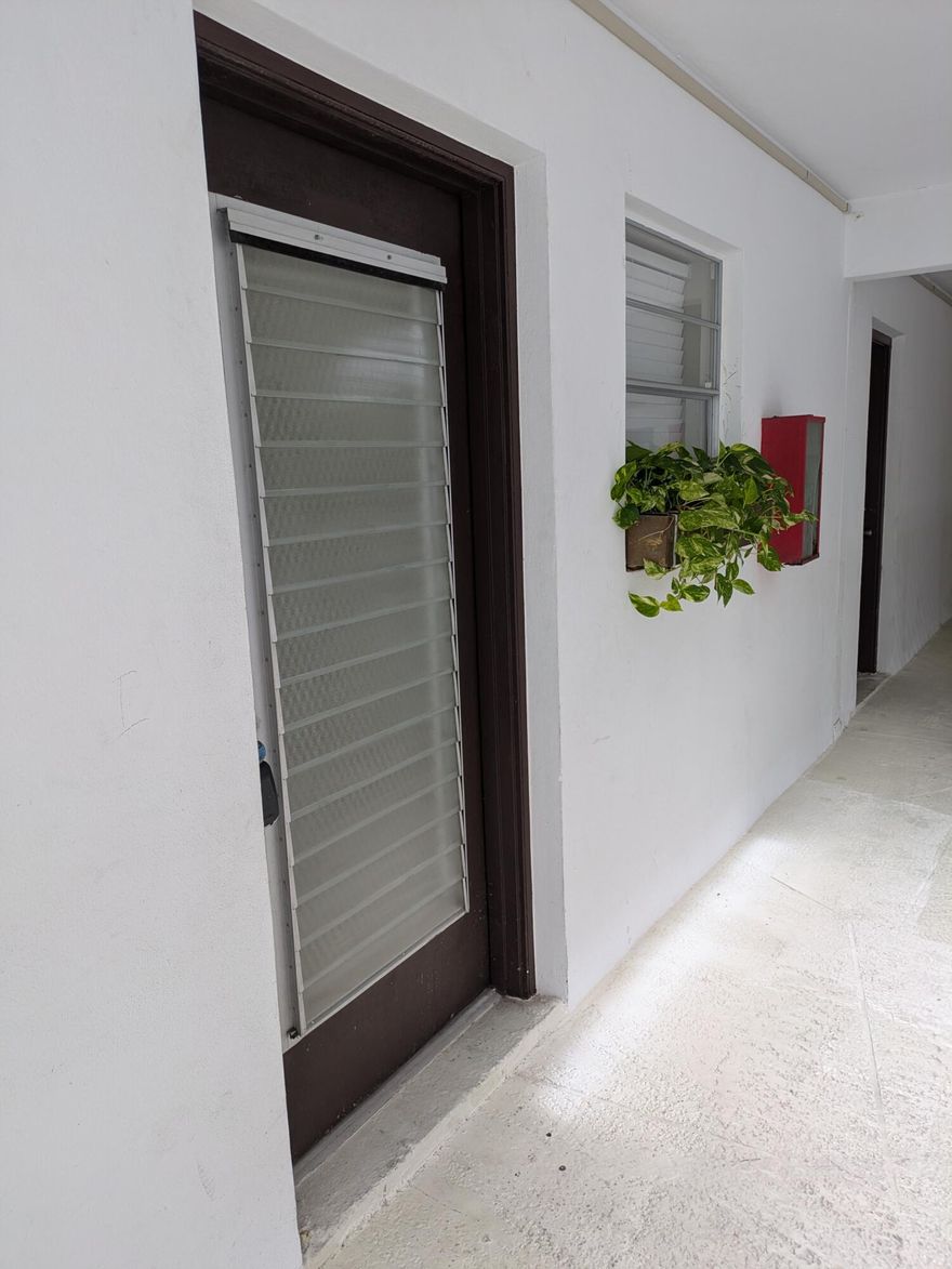 Amazing investment opportunity or great to make your own home! This unit is beautifully tiled throughout, has spacious living areas and a large bedroom.  On site laundry, one assigned parking space and plenty of guest parking. Yes, you can rent right away. Call for your private showing today!