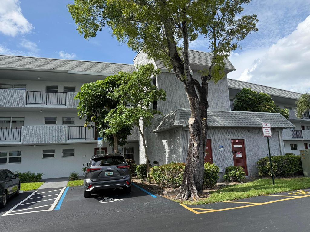 Photo of 8105 NW 61st Street #A206, Tamarac, FL 33321 (MLS # B26036087)