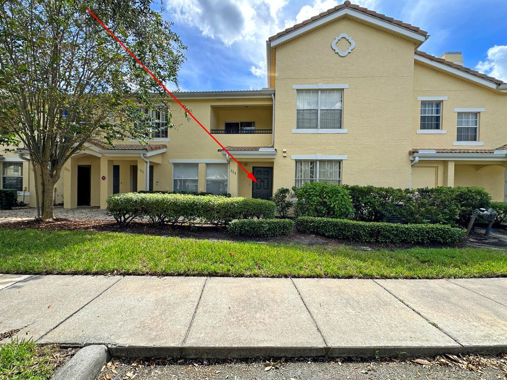 Photo of 120 SW Peacock Boulevard #204, Port Saint Lucie, FL 34986 (MLS # R11034118)