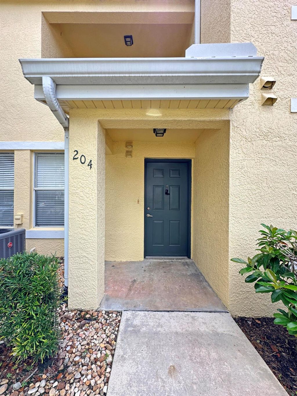 Photo of 120 SW Peacock Boulevard #204, Port Saint Lucie, FL 34986 (MLS # R11034118)
