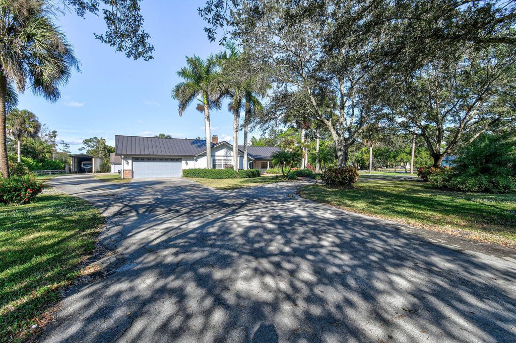 Photo of 14863 22nd Road N, Loxahatchee Groves, FL 33470 (MLS # R11145560)