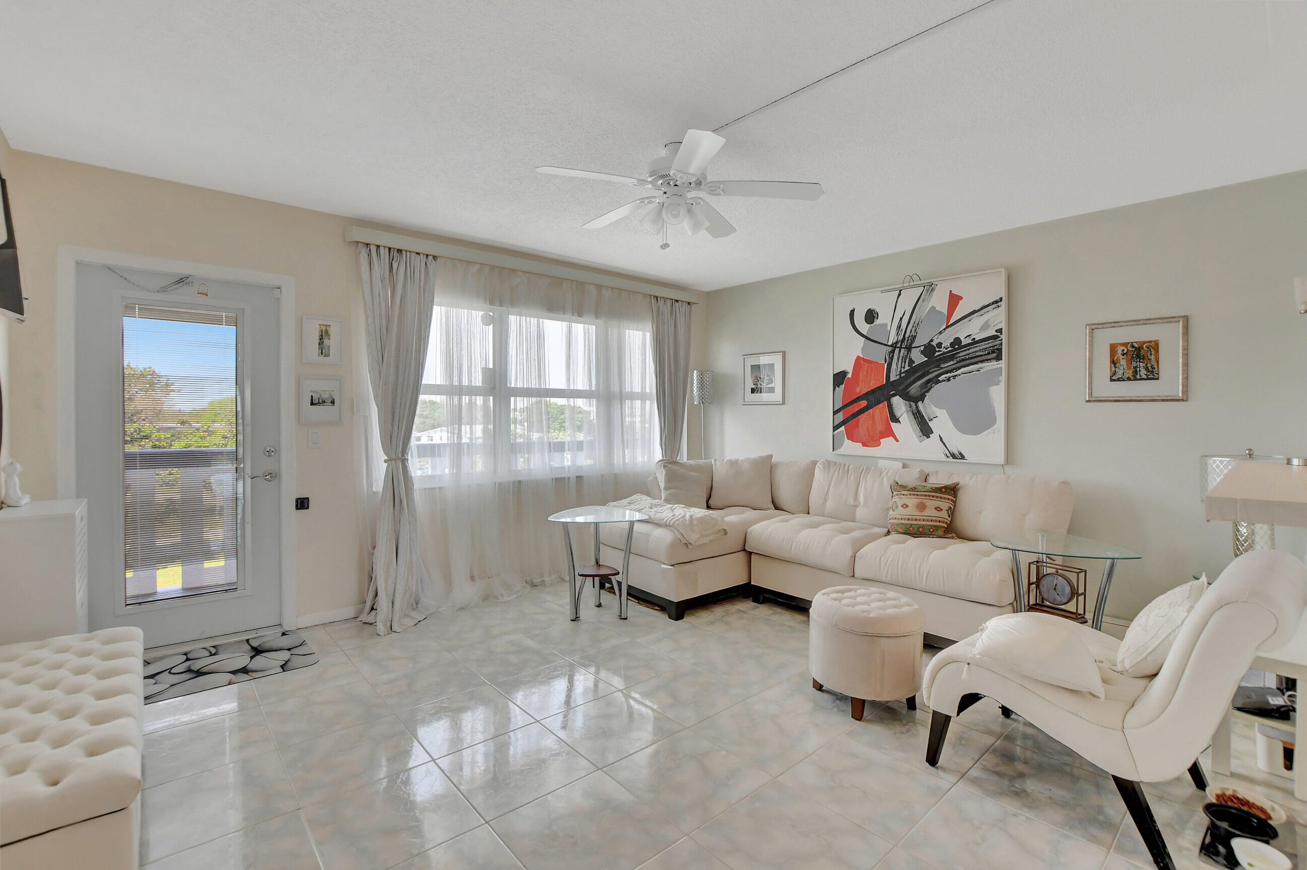 MOVE-IN READY 4TH Floor Condo in Vibrant 55+ Community! This home has a NEW ROOF, NEW AC, IMPACT WINDOWS/DOOR. Experience the perfect blend of comfort and convenience in this immaculate home. Deerfield Beach is close to Hillsboro Pier and the Beach, Deer Creek is a picturesque golf course community. Step into a clean and bright living space featuring impact windows, door and sliders. Creating an elegant atmosphere with lake view and relaxation. With a brand-new roof and newly added parks, this community promises an enhanced lifestyle for active adults. Enjoy a resort-like experience just steps away from the sparkling pools, making relaxation a breeze. Situated near from the breathtaking Deerfield Beach and its iconic pier, you'll have easy access to sun, sand, and sea.