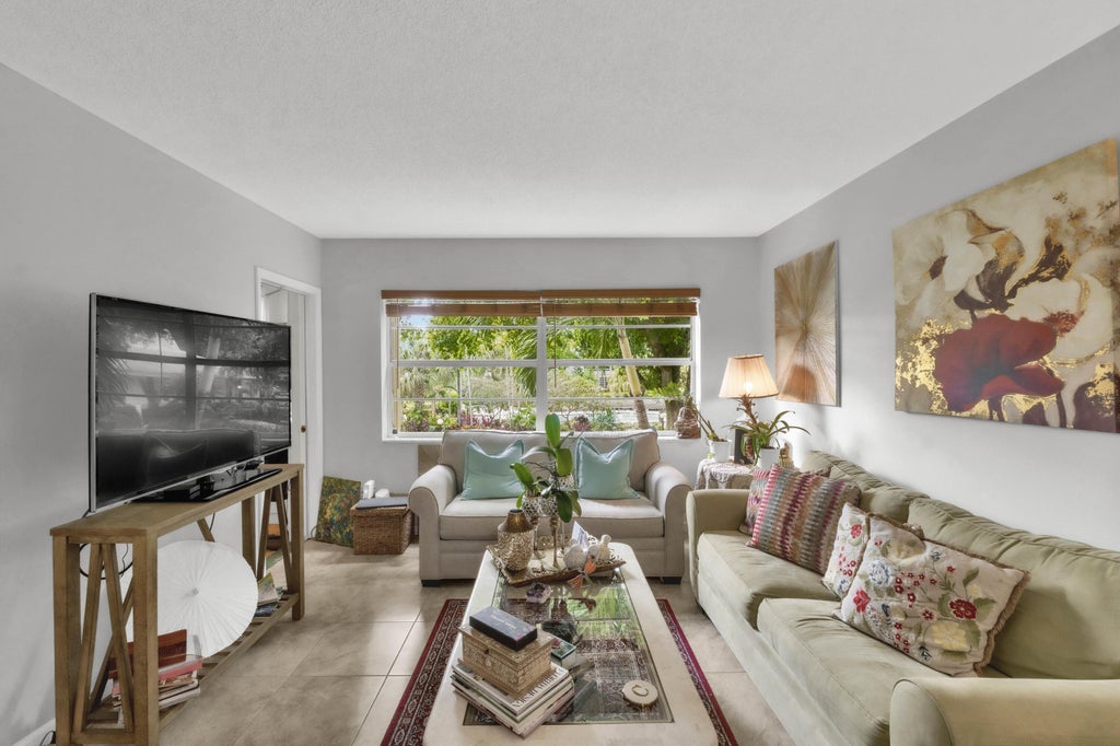 Photo of 5141 W OAKLAND PARK Boulevard #208, Lauderdale Lakes, FL 33313 (MLS # B26094895)